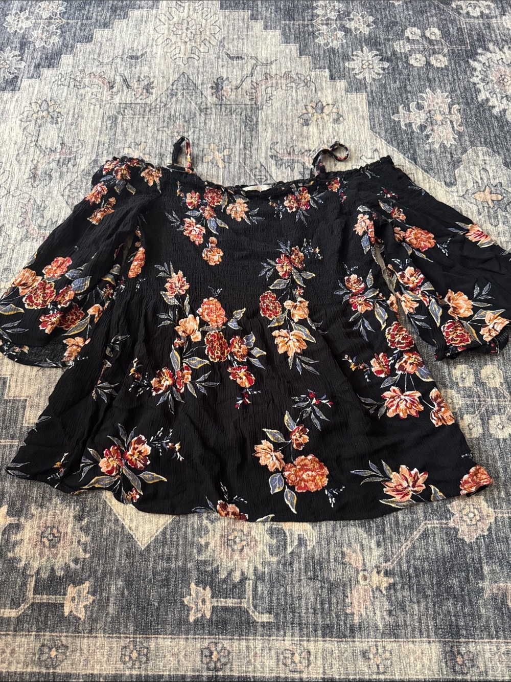 Black Floral Off-Shoulder Blouse with Rust and Pink Blooms